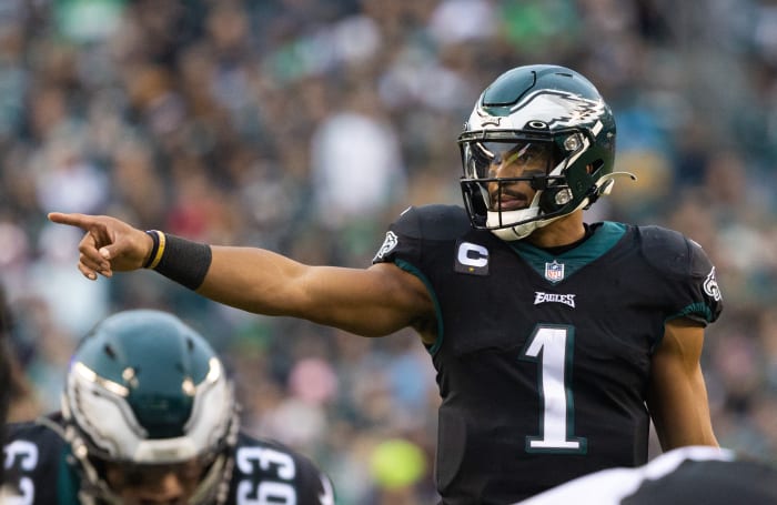 Philadelphia Eagles quarterback Jalen Hurts points his finger to call a play